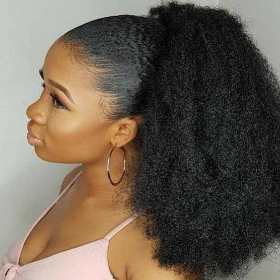 lady wearing high ponytail with Afro weave