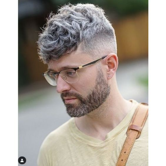 Another picture of a man rocking the curly grey taper look