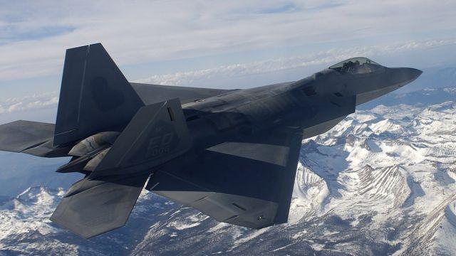 F-22 jet flying over the Sierra Nevada mountains in an archive photo