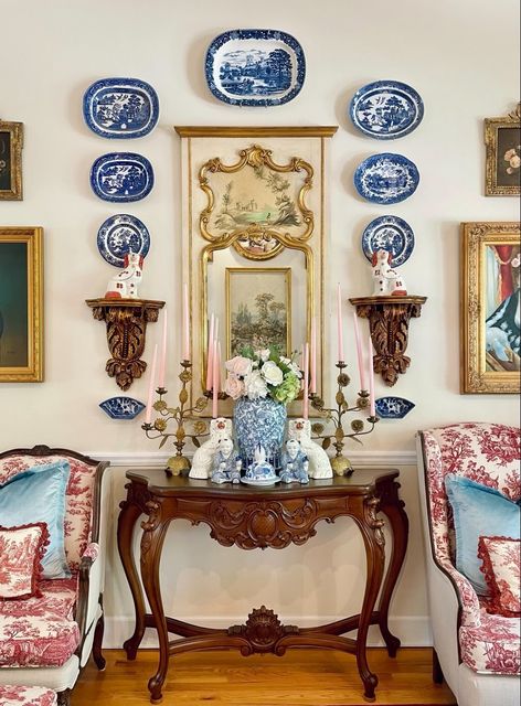The Mid 19th century French Giltwood Trumeau mirror with a hand painted oriental scene that I have in my formal living room is definitely my favorite online auction find! 
