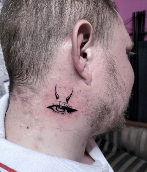 Horns Evil Eye Tattoo