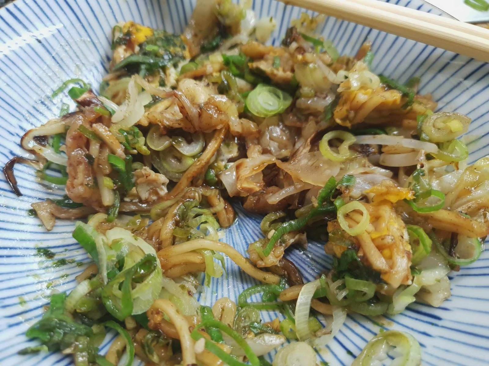 end bits of okonomiyaki in a bowl