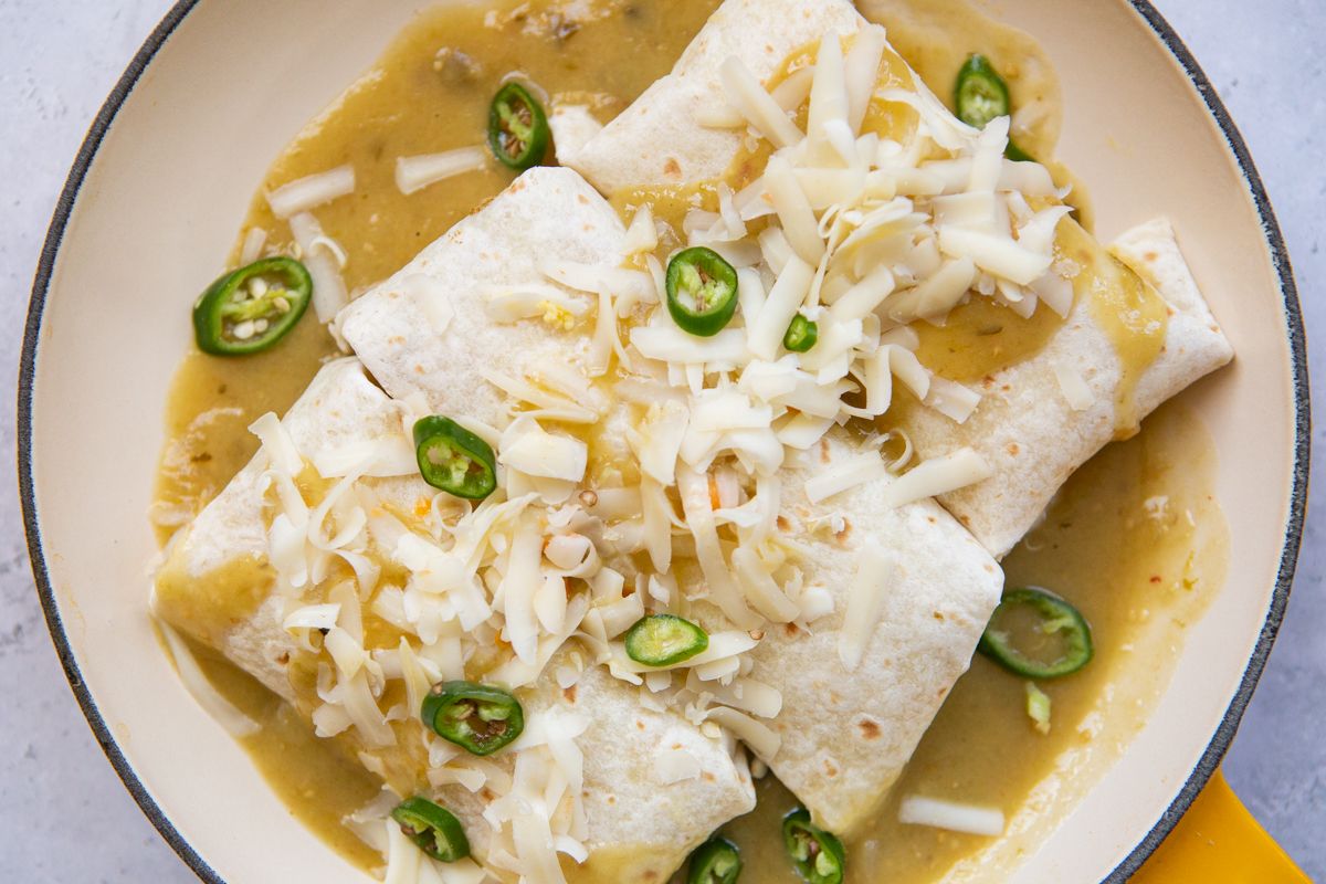 green chile breakfast burritos served on a skillet