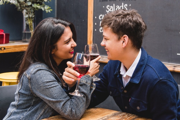 Znalezione obrazy dla zapytania: couple locking arms, holding glass of wine free pictures