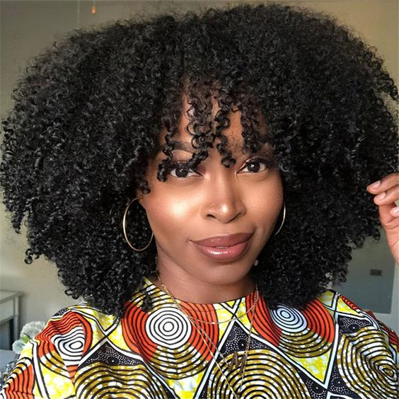 a lady wearing an afro kinky curly hair