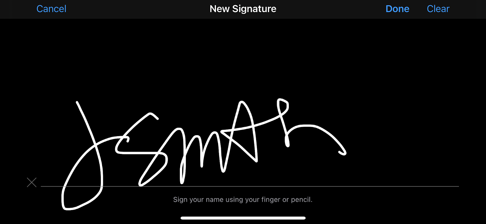 iPhone signature screen with a hand-drawn signature.