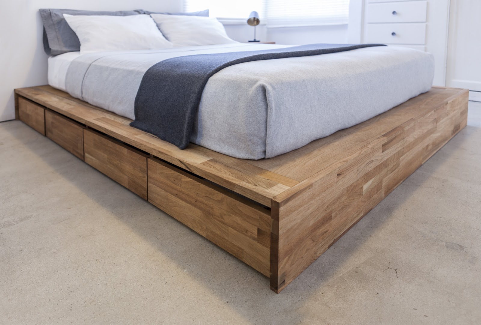 Almost any platform bed frame can be converted into a murphy bed.