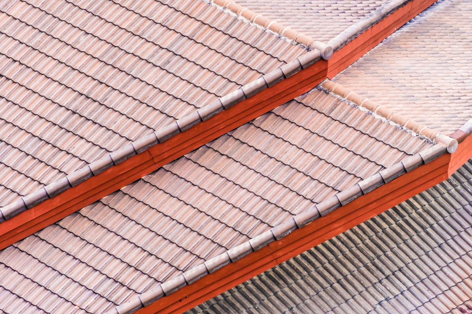 Multiple orange roofs with bricks