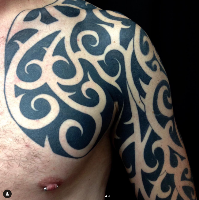 Wonderful Tribal Tattoo Chest Design