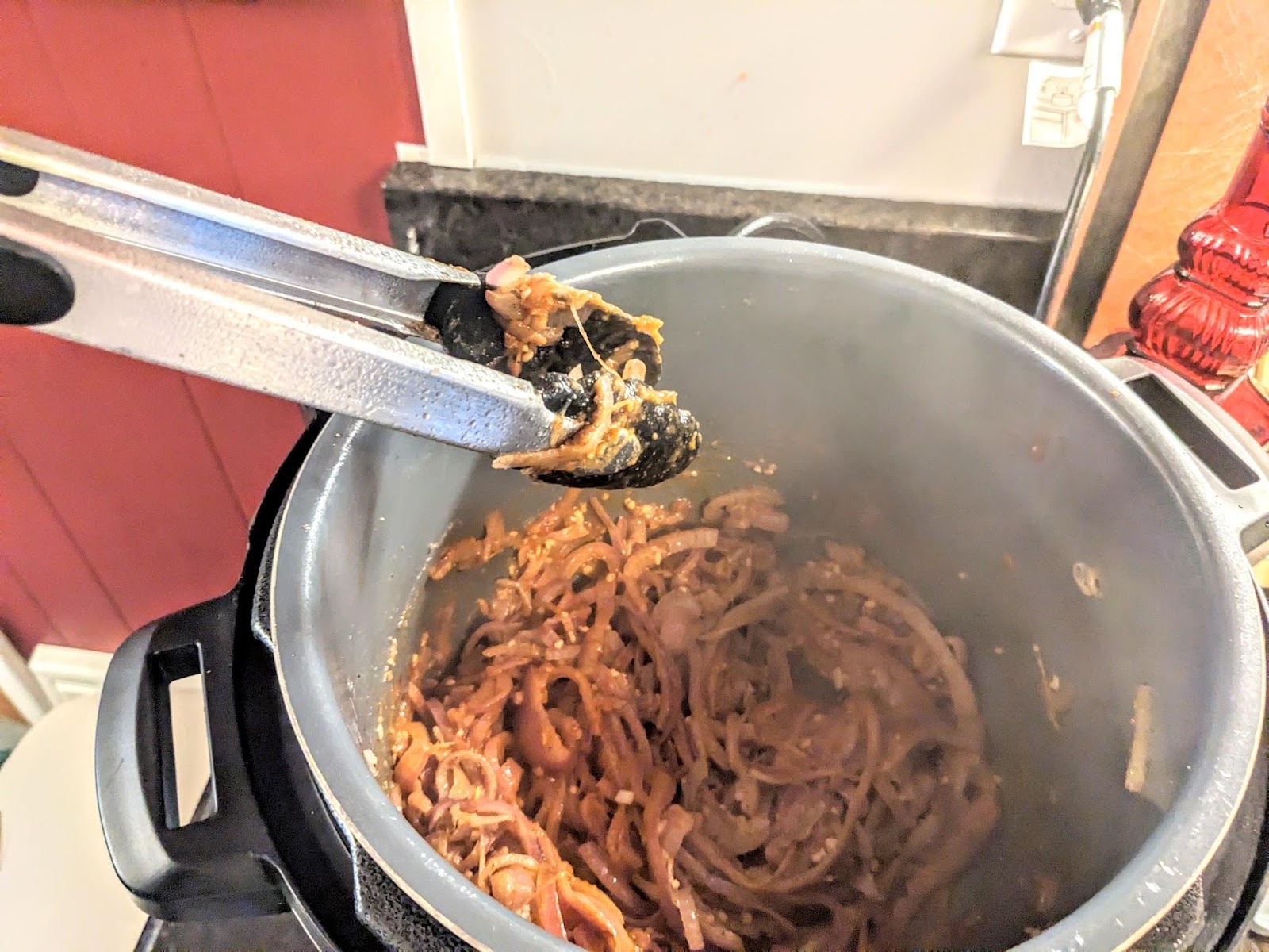 Sauteed red onions, cumin, and garlic in the Instant Pot