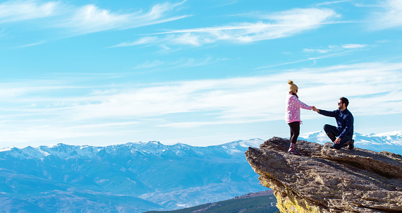 mountain top couple proposal