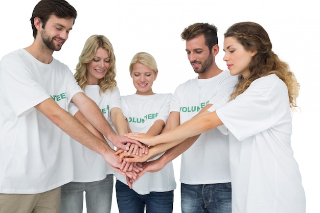 Photo group of young volunteers with hands together