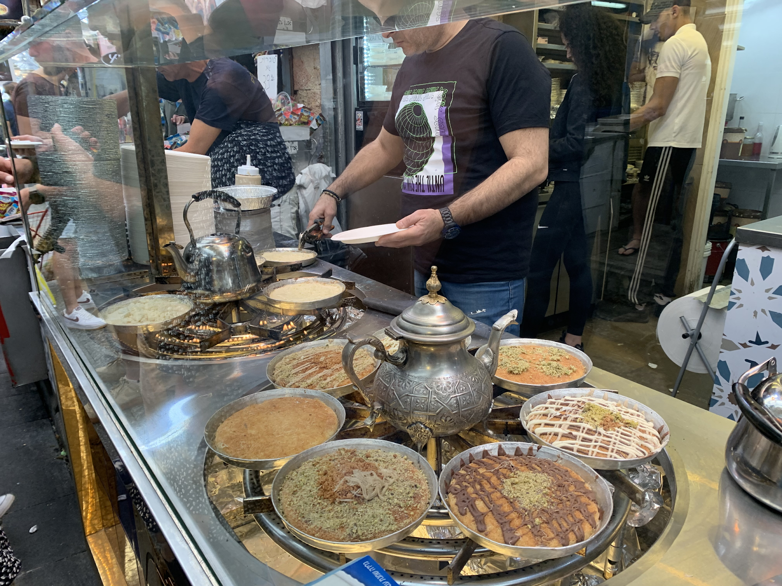 Freshly made Kanafeh dessert at the Mahane Yehuda market