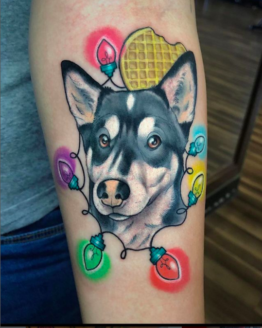 Dog’s Face With Christmas Lights Tattoo