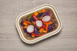 Buckwheat Noodles, Cabbage, Peppers, Green Onions, and Sweet Potato Mixed in a Sweet Chili Sauce, Topped with Radishes