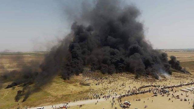 Tires burning near the Gaza border during Friday's protest