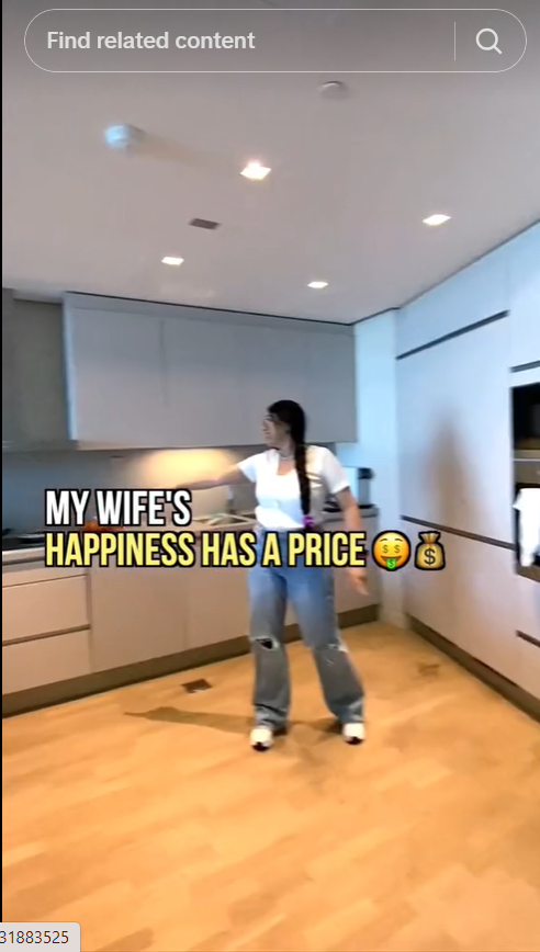 A screenshot of a social media post showing a woman and some text saying "my wife's happines has a price"