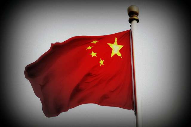 Chinese Flag. Credit: Philip Ja?genstedt via Flickr (CC BY 2.0) filter added.