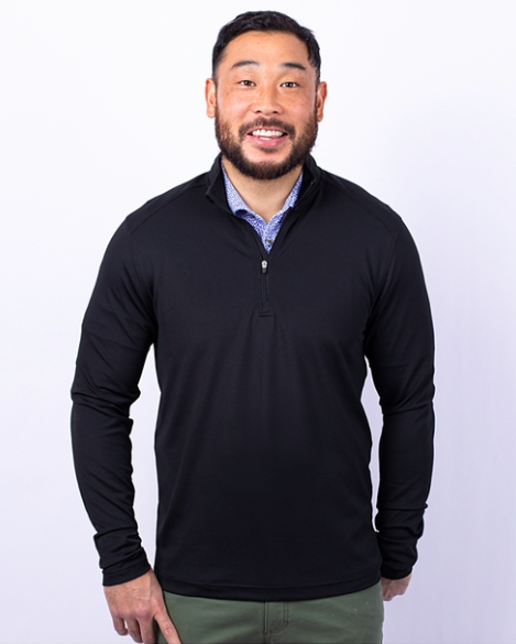 Man Wearing The Virtue Eco Pique Recycled Quarter Zip Pullover