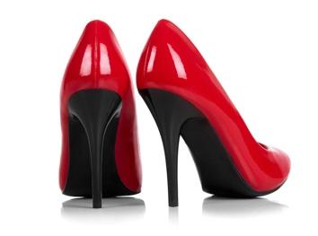 A pair of red high heeled shoes
Description automatically generated