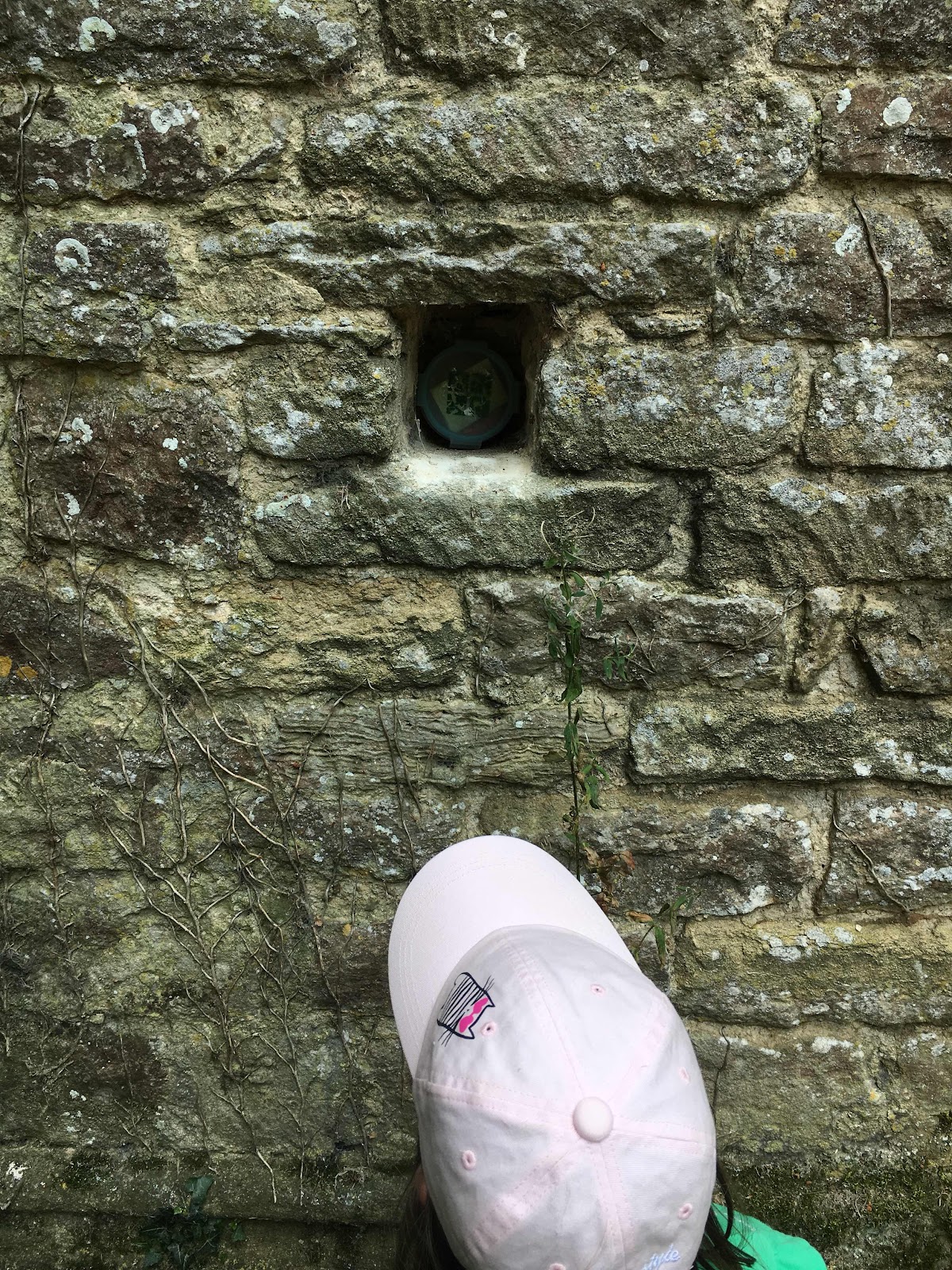 Small geocache hidden in a wall