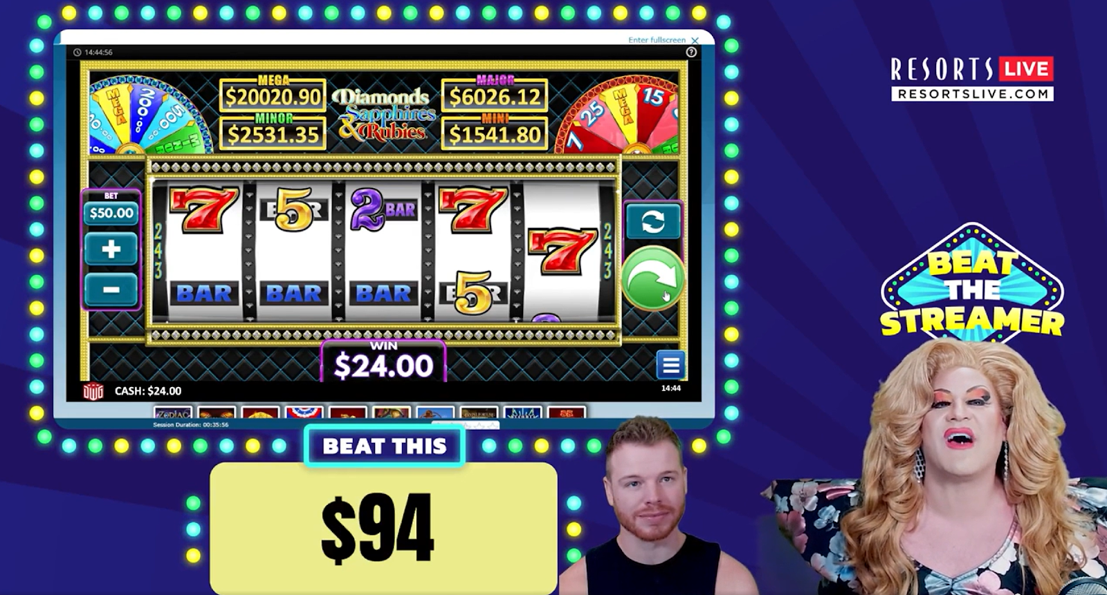 A person standing in front of a large screen with numbers and numbers 
Beat the streamer game 
