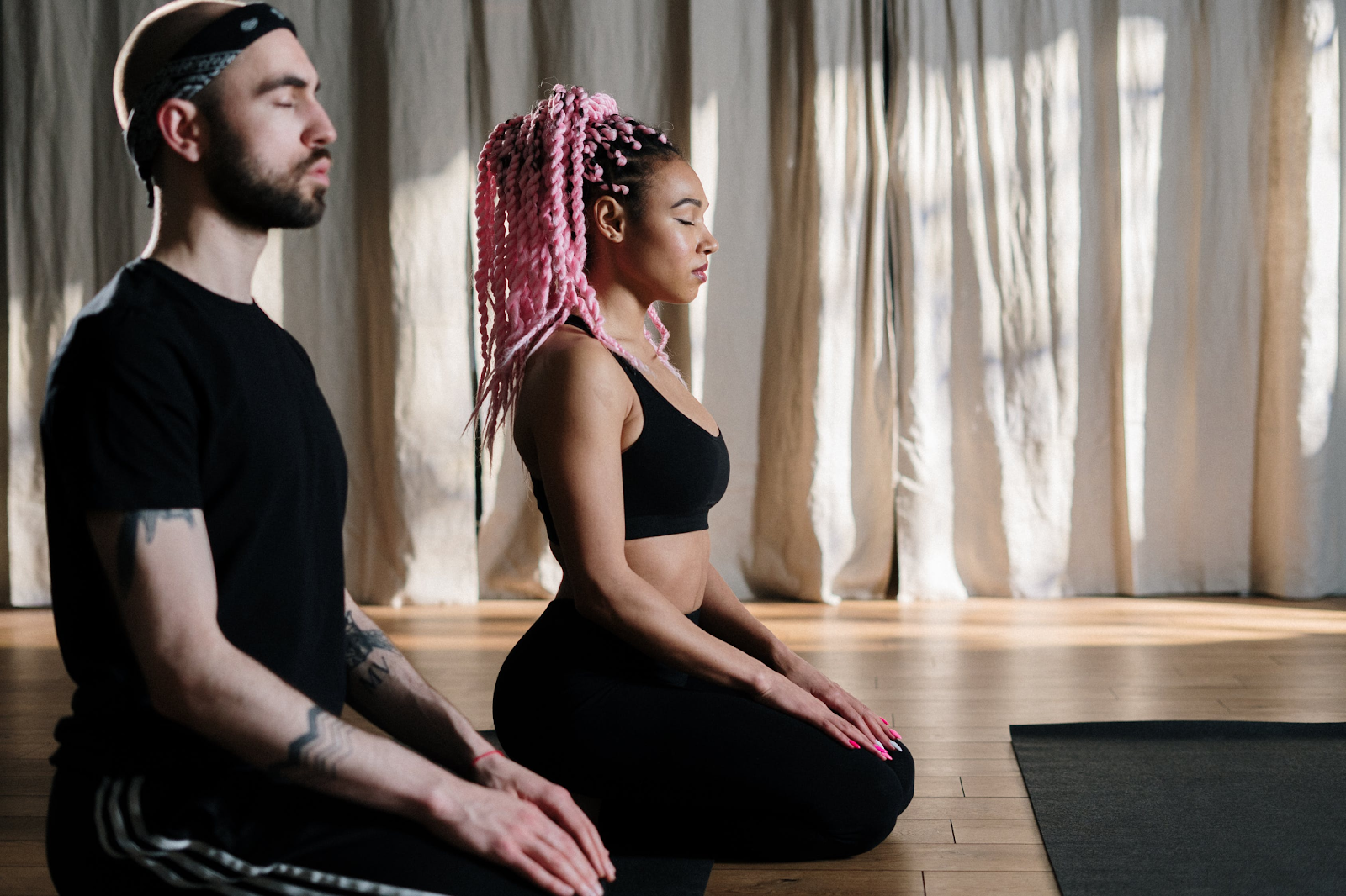 Man and Woman doing yoga