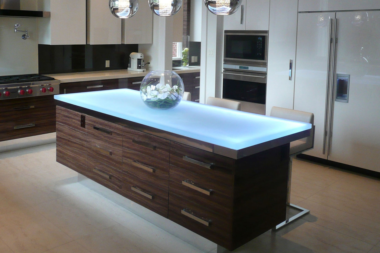 glass kitchen countertop with wooden cabinets