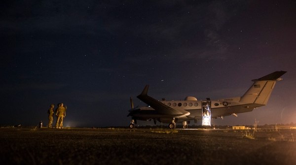 A forward area refueling point team refuels an MC-12W Liberty during Exercise Emerald Warrior at Hurlburt Field, Fla., in May 2016. (Tech. Sgt. Gregory Brook/Air Force)