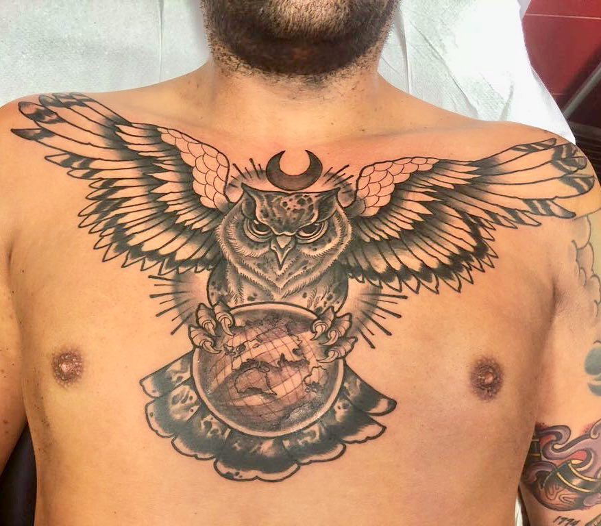 owl with globe tattoo