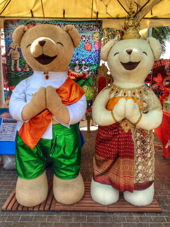 Life size, cultural teddy bears outside the Teddy Bear Museum.