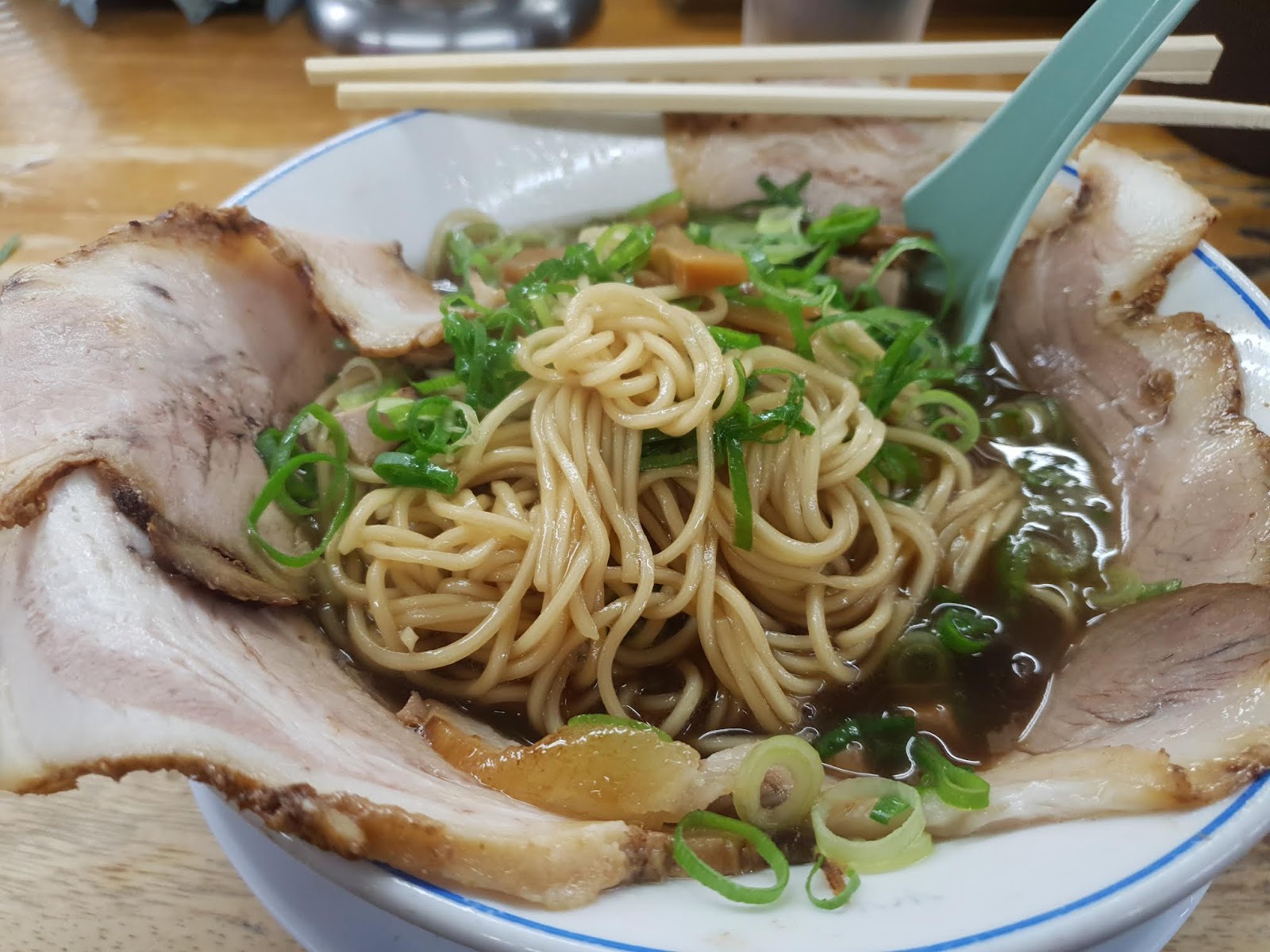 medium thick noodles and kurobuta pork in Taiho Ramen shoyu broth