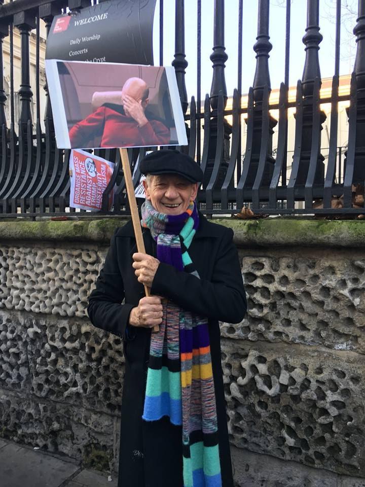 Ian McKellan holds Patrick Stewart placard for London's Women's March