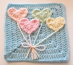 heart balloon appliques on solid crochet square