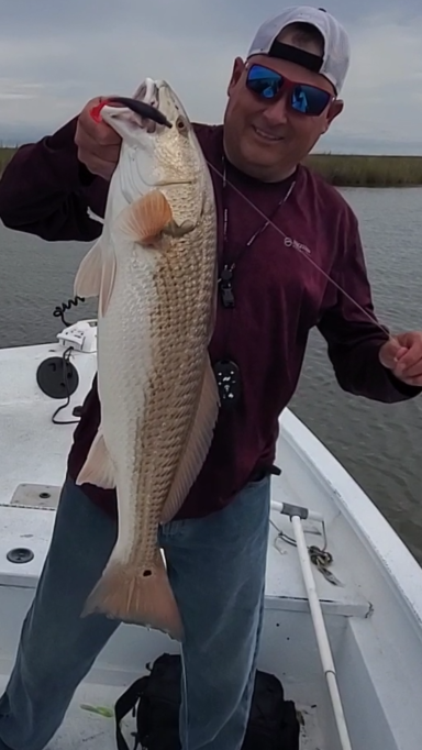 Gary Hill with a Redfish caught on the Angling Ai Rip Rap