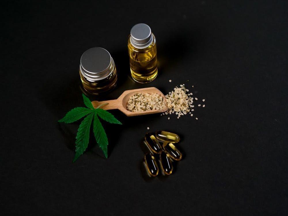 Photo of Marijuana Stuffs on Dark Background