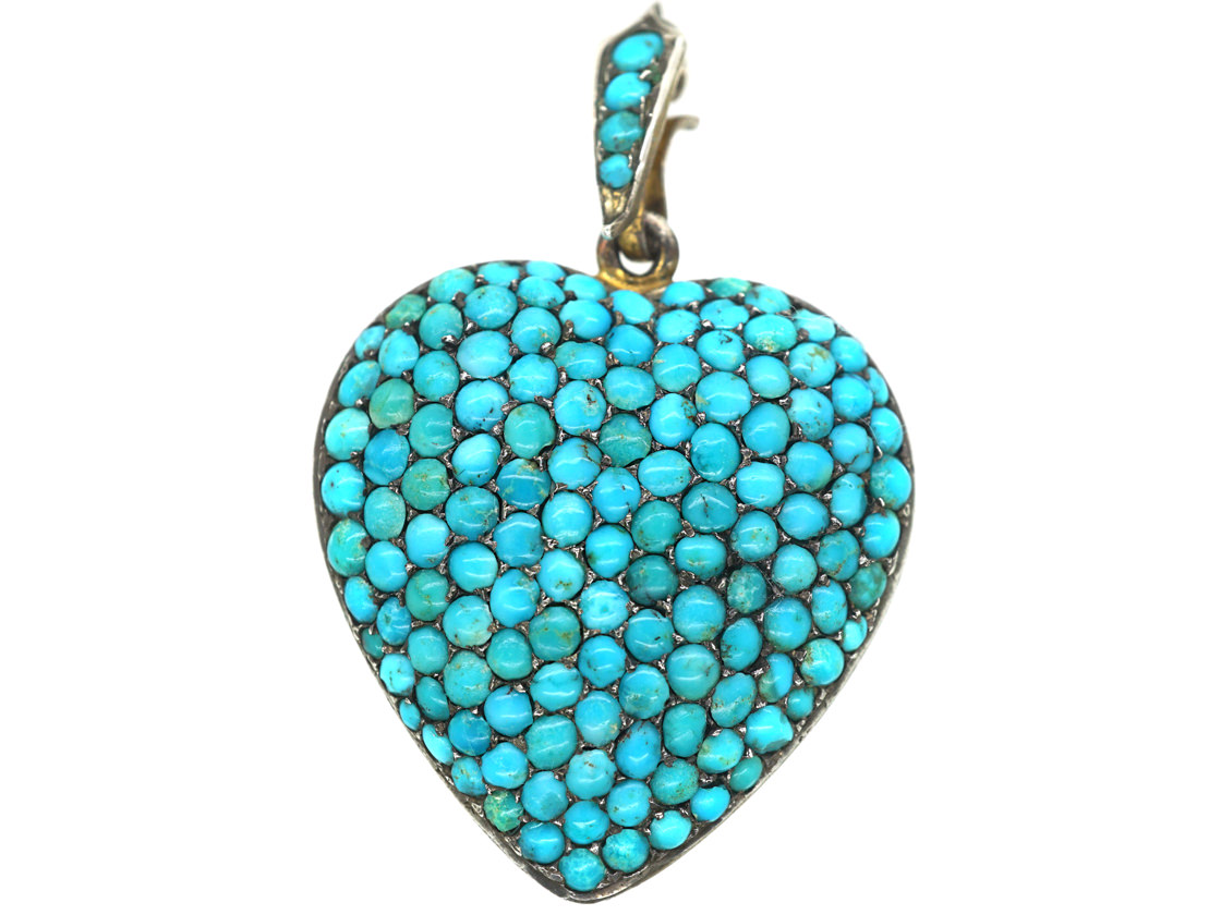 Heart shaped turquoise locket with gold hook, like the one bought by McClelland in the newspaper story of romance and crime.