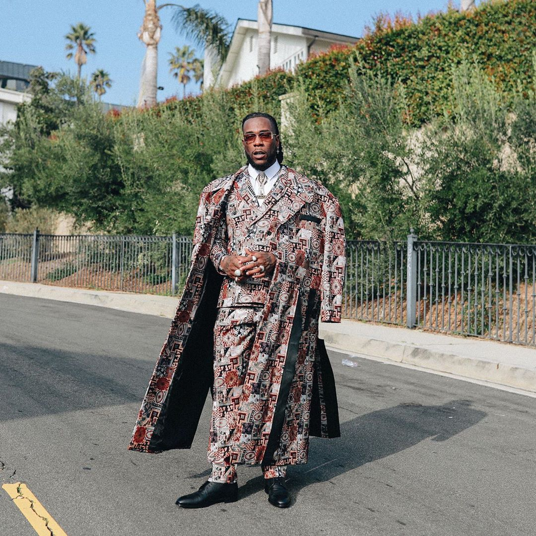 Burna Boy in a three-piece printed suit by Kenneth Ize