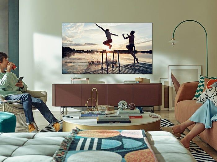Samsung QN90A TV hanging on a wall