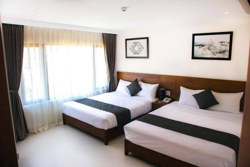 Một góc phòng tiện nghi, xinh xắn và vô cùng thoáng mát tại khách sạn Đà Nẵng gần biển Robin