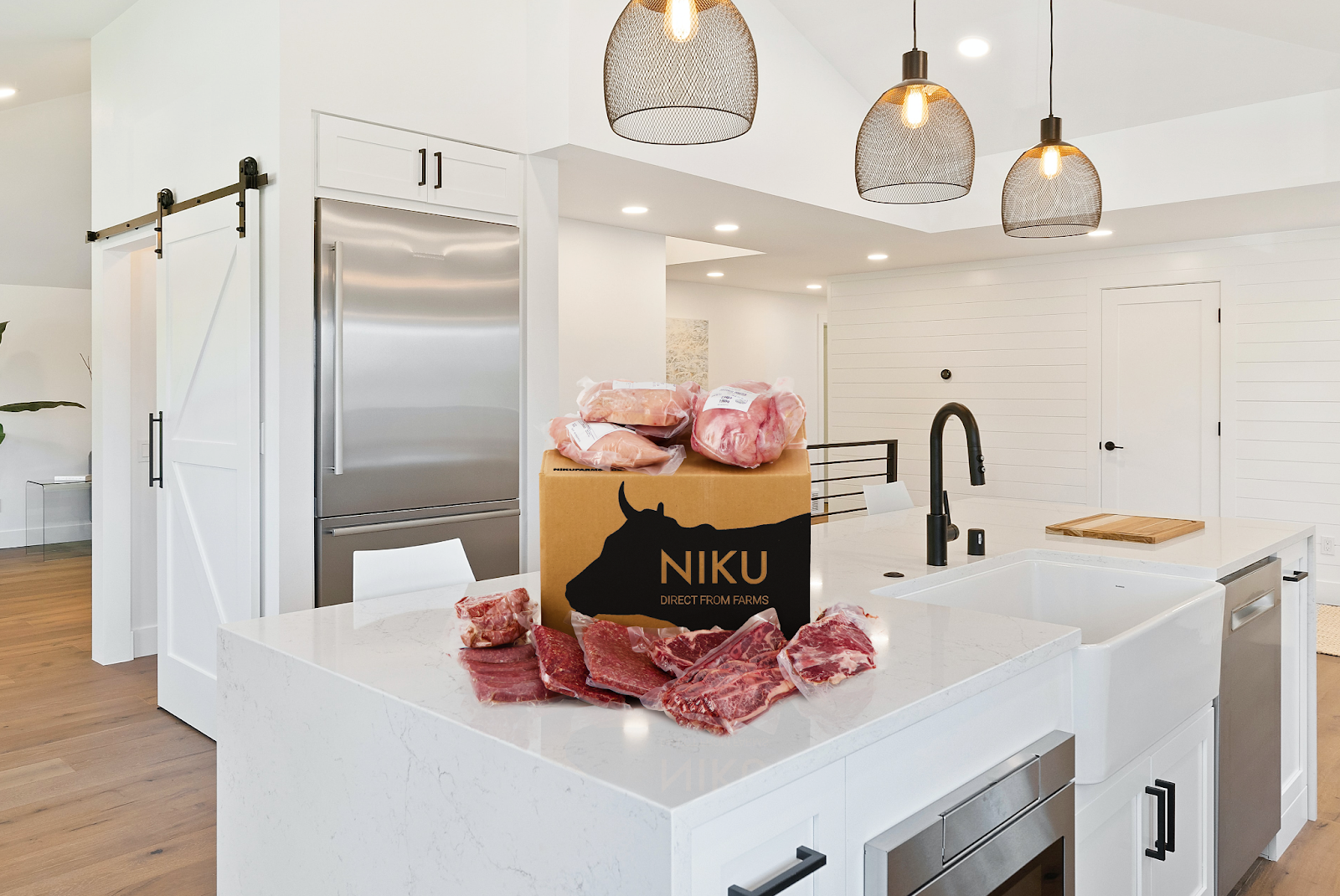 A NIKU Farms meat box on a white counter in a large kitchen.