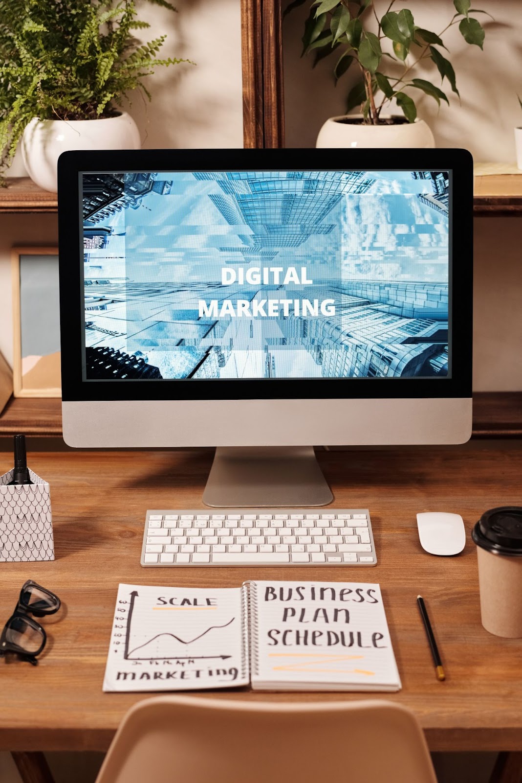 Outsource your marketing to grow your business. Digital marketing computer screen.