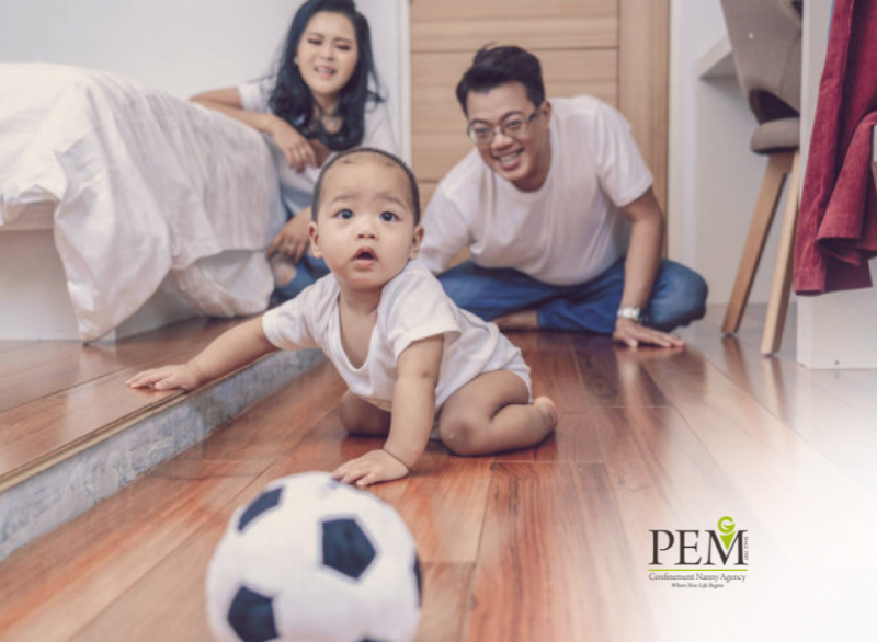Baby Playing With Parents - PEM Confinement Nanny Agency