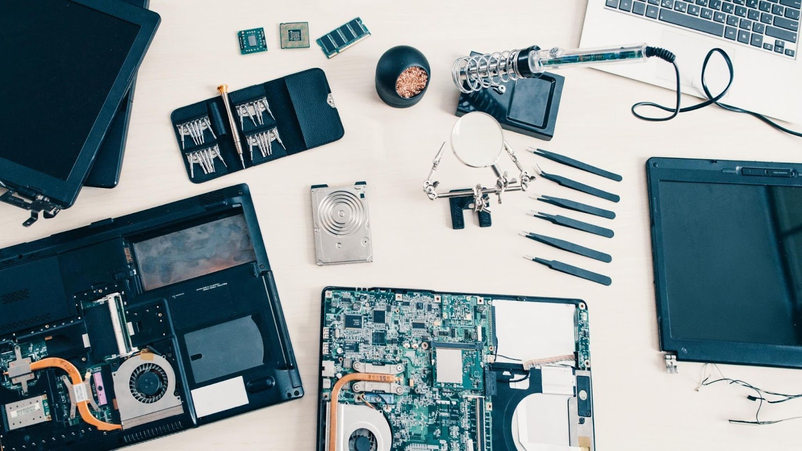 Various computer components on a table. 