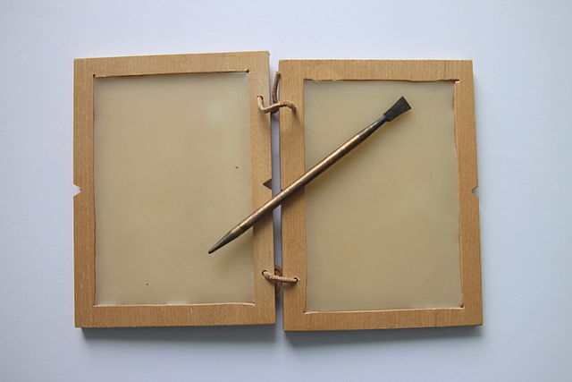 Peter van der Sluijs - Own work
Writing tablet with wax and stylus. Roman period. The sharp tip was used for writing and the flat end was for wiping it out.