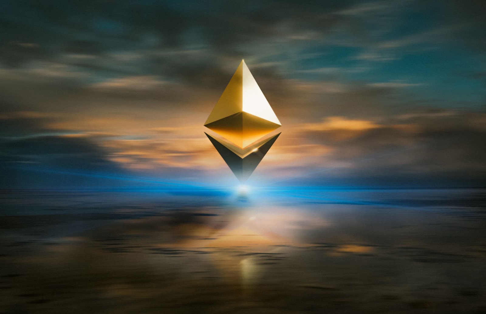 Golden Ethereum symbol suspended in mid-air on a dusky, cloudy landscape background.
