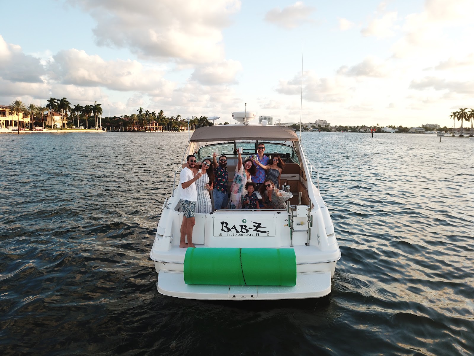 A group enjoying the sunset out with Amanzi Charters.