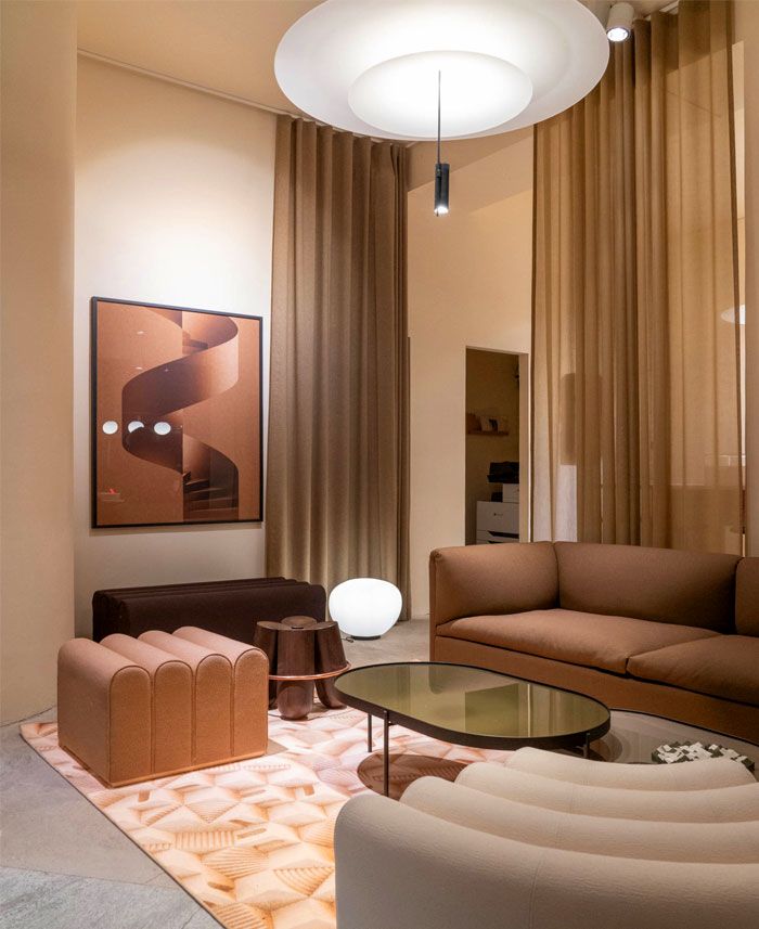 A cozy and modern living space with warm tones and soft lighting, creating an inviting atmosphere.