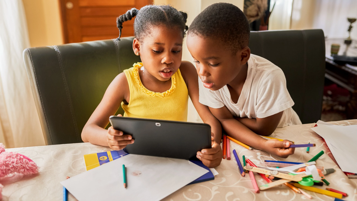 Children learning using a smartphone
