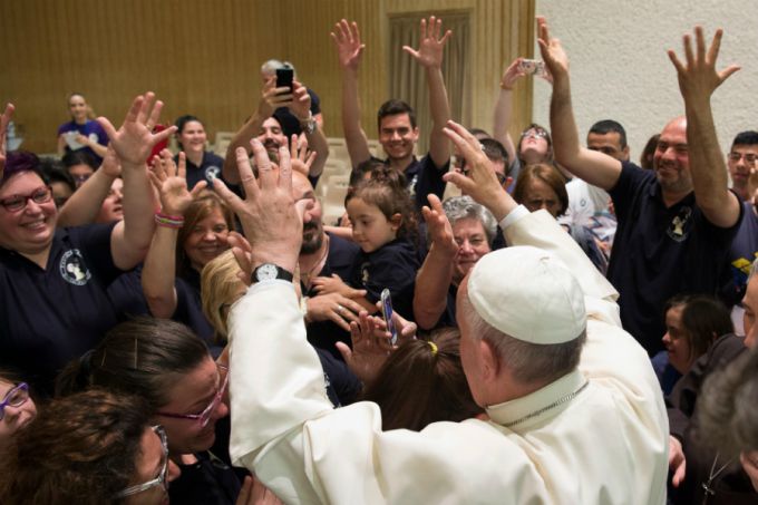 Pope Francis greets participants of the Convention for Persons with Disabilities at the Paul VI Hall in the Vatican, June 11, 2016. Credit: L'Osservatore Romano.